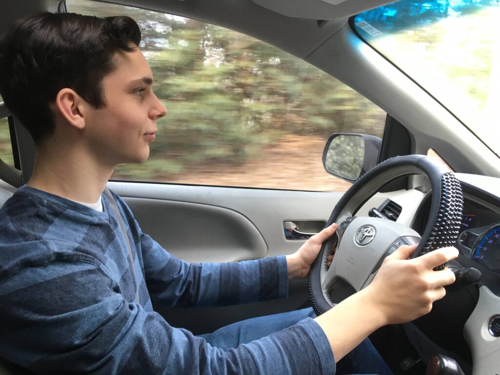 15 year old driving for the first time and feeling proud