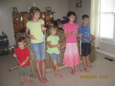 5 little kids play the chimes for homescchool