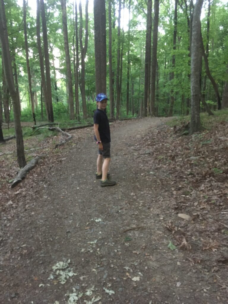 Sam running down the trail.