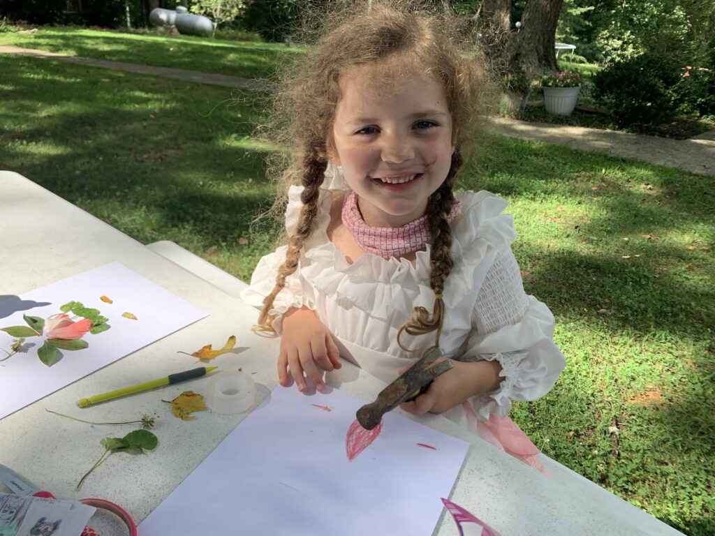 6 year old does art outside